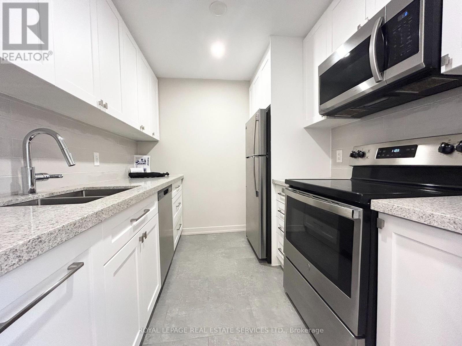 710 - 101 Millside Drive, Milton, Ontario  L9T 3C2 - Photo 5 - W12752630