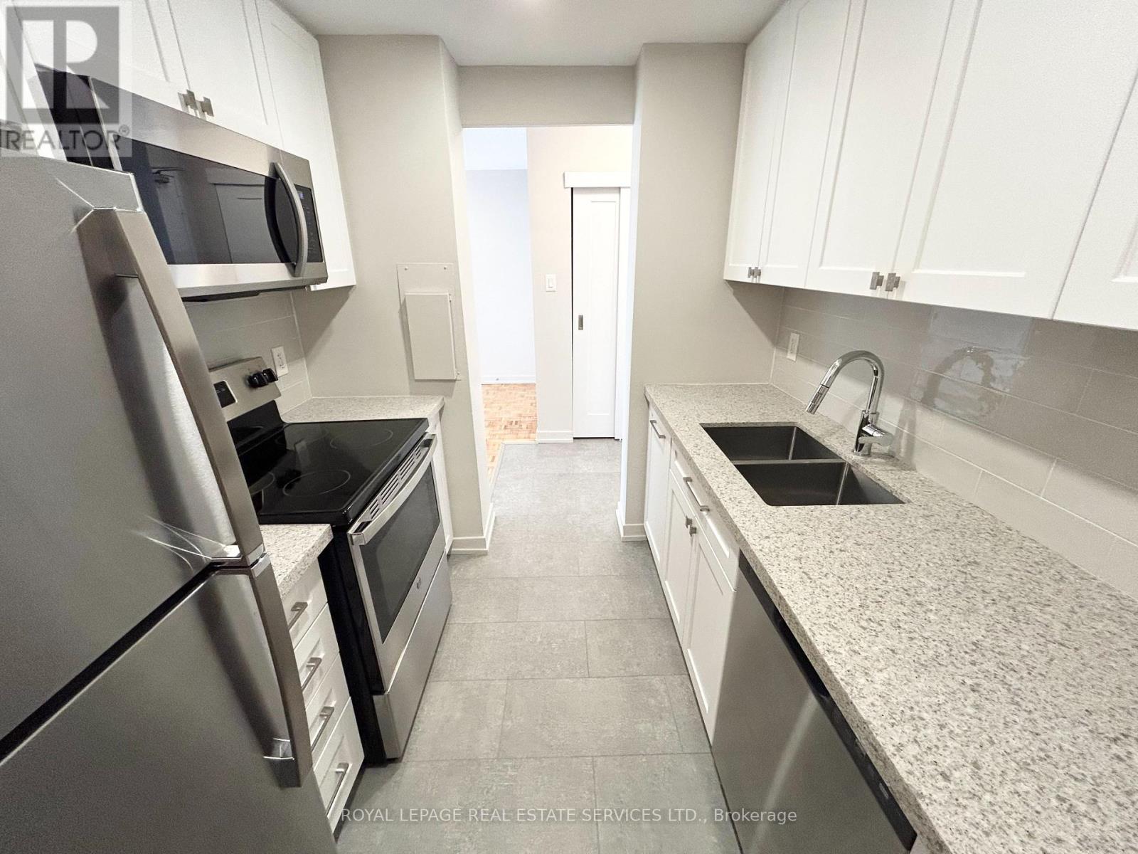 710 - 101 Millside Drive, Milton, Ontario  L9T 3C2 - Photo 8 - W12752630