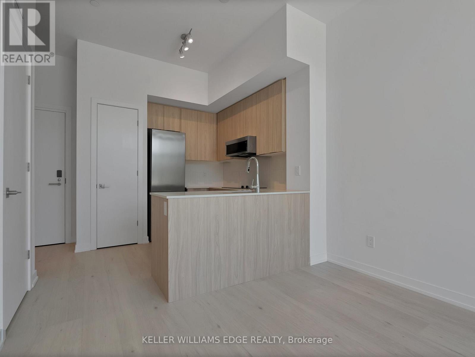 124 - 2501 Saw Whet Boulevard, Oakville, Ontario  L6M 5N2 - Photo 4 - W12752706