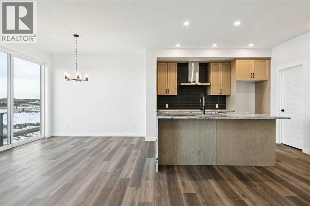 54 Creekstone Common Sw, Calgary, Alberta  T2X 6H4 - Photo 9 - A2281399