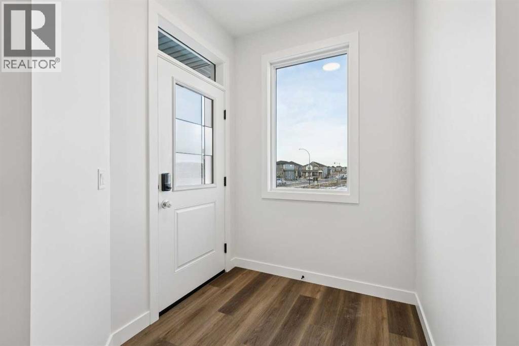 54 Creekstone Common Sw, Calgary, Alberta  T2X 6H4 - Photo 3 - A2281399