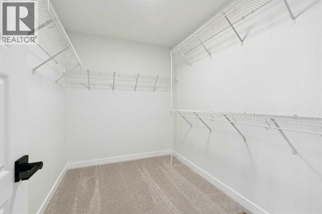 54 Creekstone Common Sw, Calgary, Alberta  T2X 6H4 - Photo 37 - A2281399