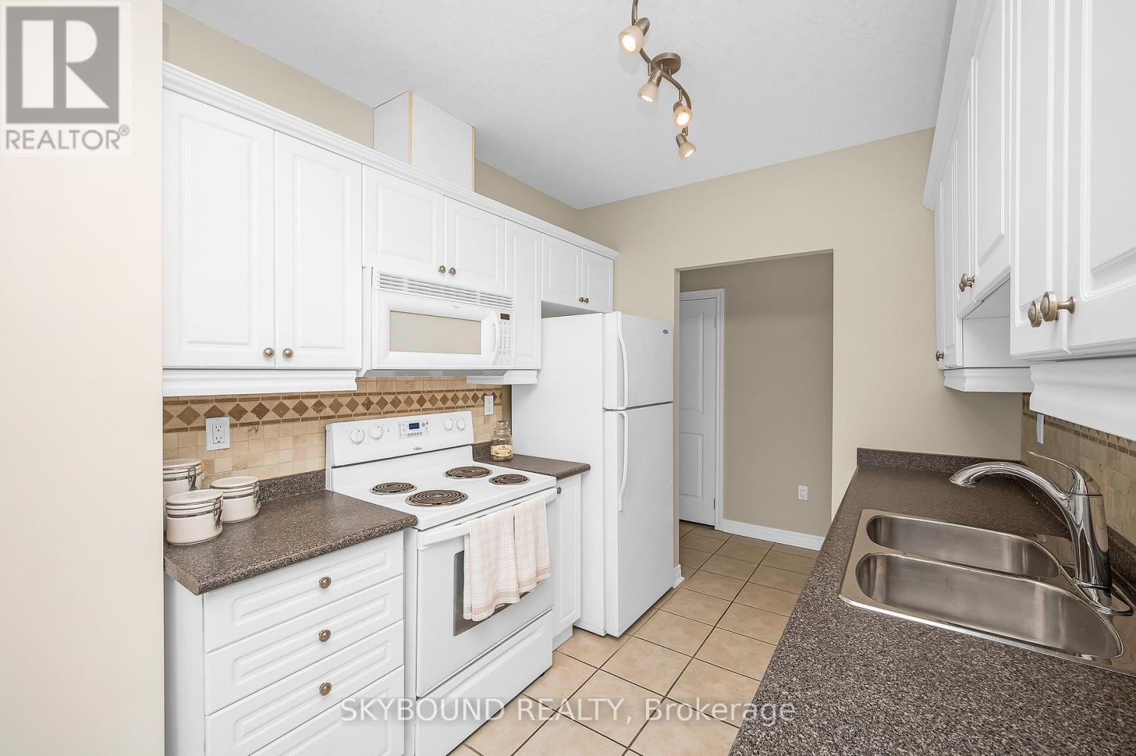 505 - 1998 Ironstone Drive, Burlington, Ontario  L7L 7P7 - Photo 11 - W12752756