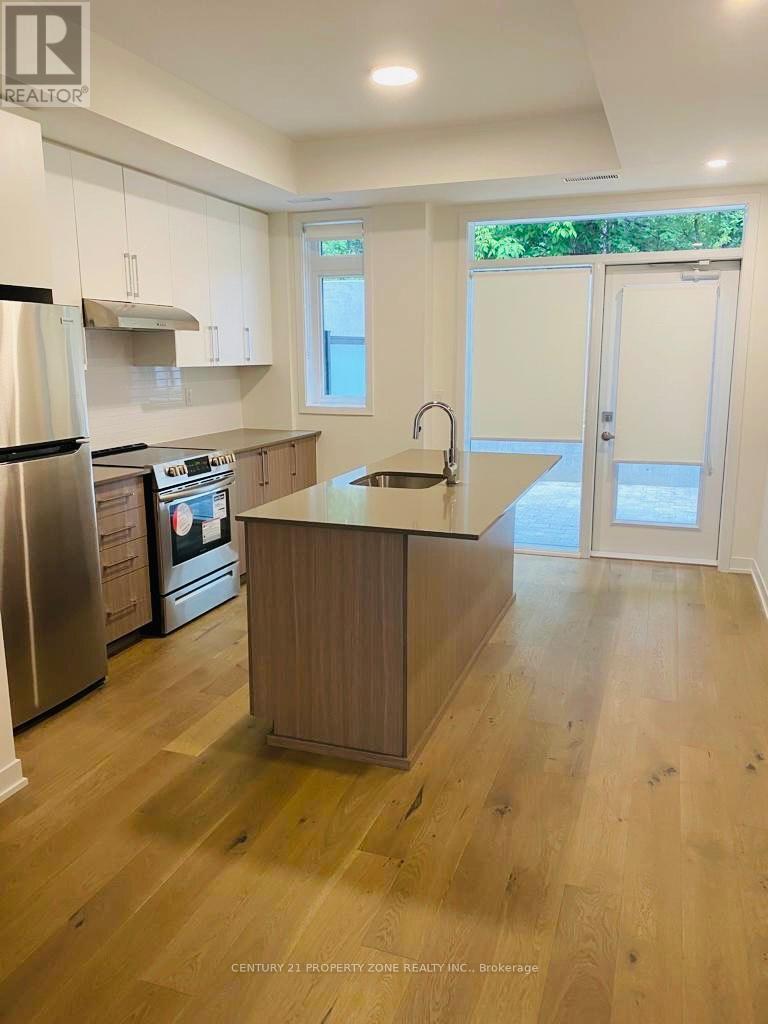 102 - 110 Canon Jackson Drive, Toronto, Ontario  M6M 0C1 - Photo 2 - W12752764