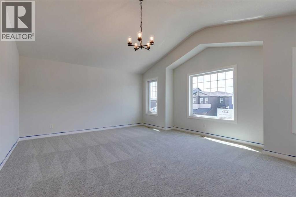 146 Northern Lights Crescent, Langdon, Alberta  T0J 1X2 - Photo 7 - A2283455