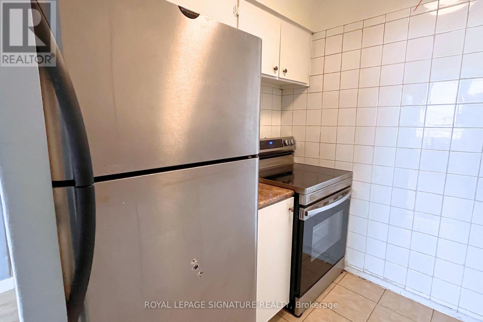 1211 - 200 Lotherton Pathway, Toronto, Ontario  M6B 2G9 - Photo 3 - W12753506