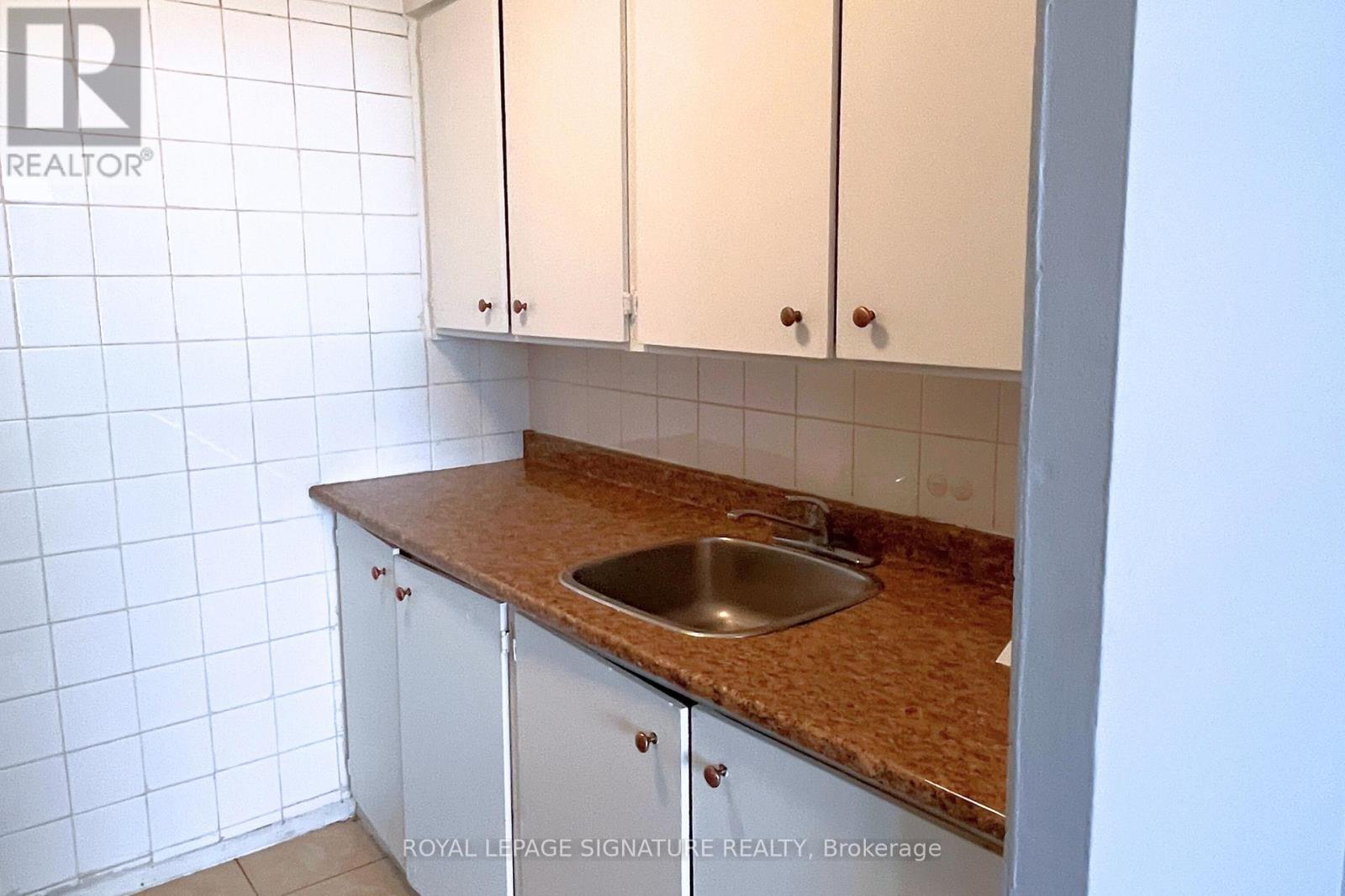 1211 - 200 Lotherton Pathway, Toronto, Ontario  M6B 2G9 - Photo 4 - W12753506