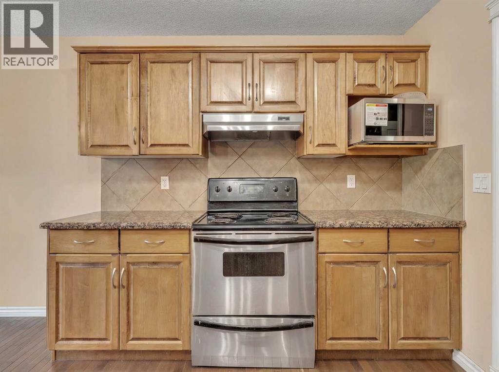 60 Sherwood Way Nw, Calgary, Alberta  T3B 1M7 - Photo 7 - A2281582