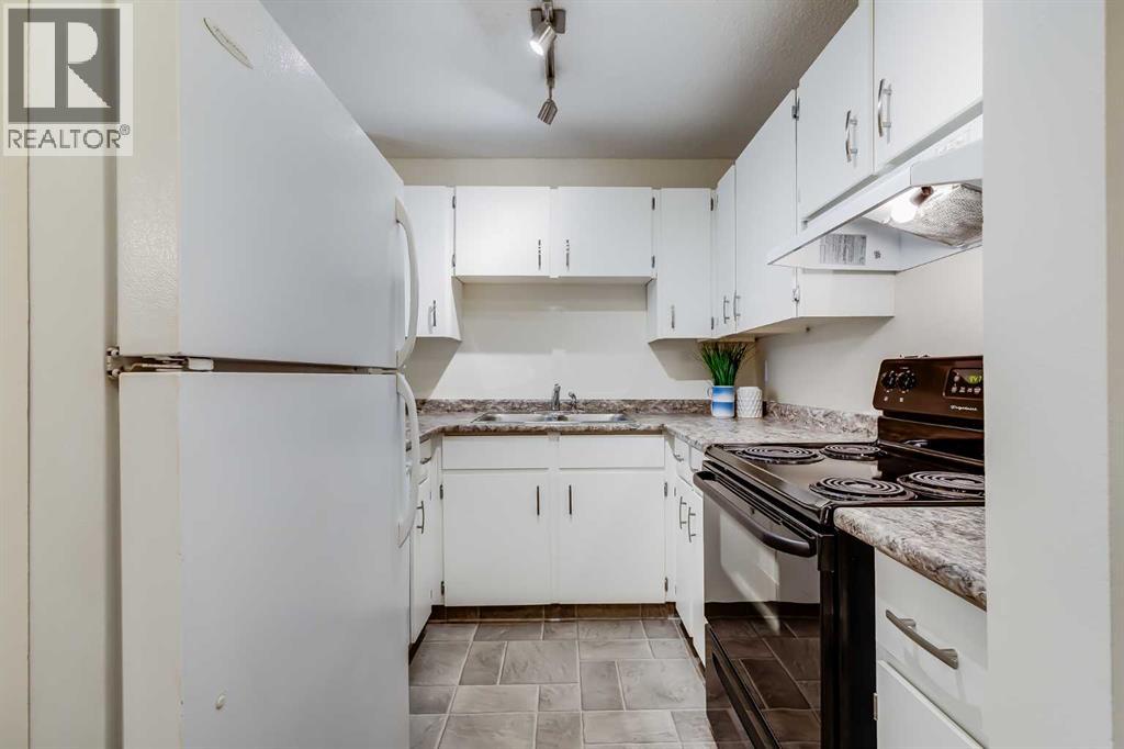 2466, 70 Glamis Drive Sw, Calgary, Alberta  T3E 6T6 - Photo 5 - A2282194