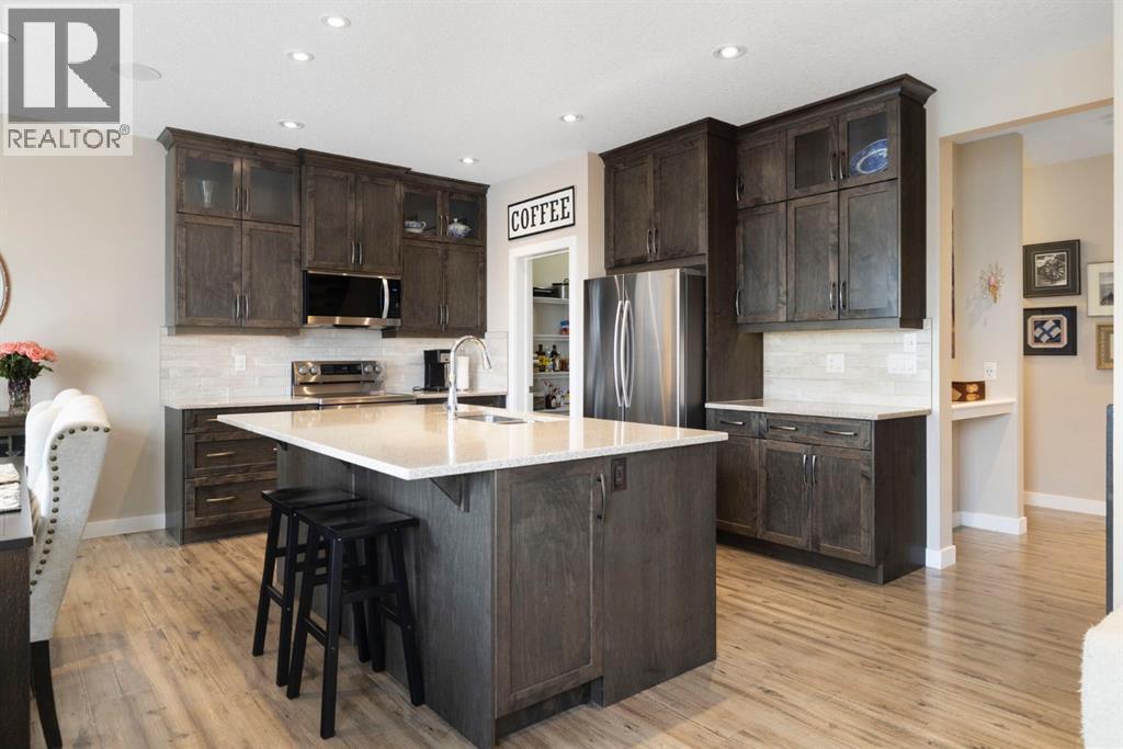 8 Emberside Glen, Cochrane, Alberta  T4C 2L6 - Photo 4 - A2282601