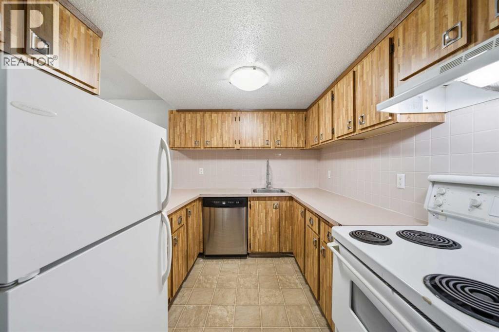 306, 2200 Woodview Drive Sw, Calgary, Alberta  T2W 3N6 - Photo 8 - A2269166