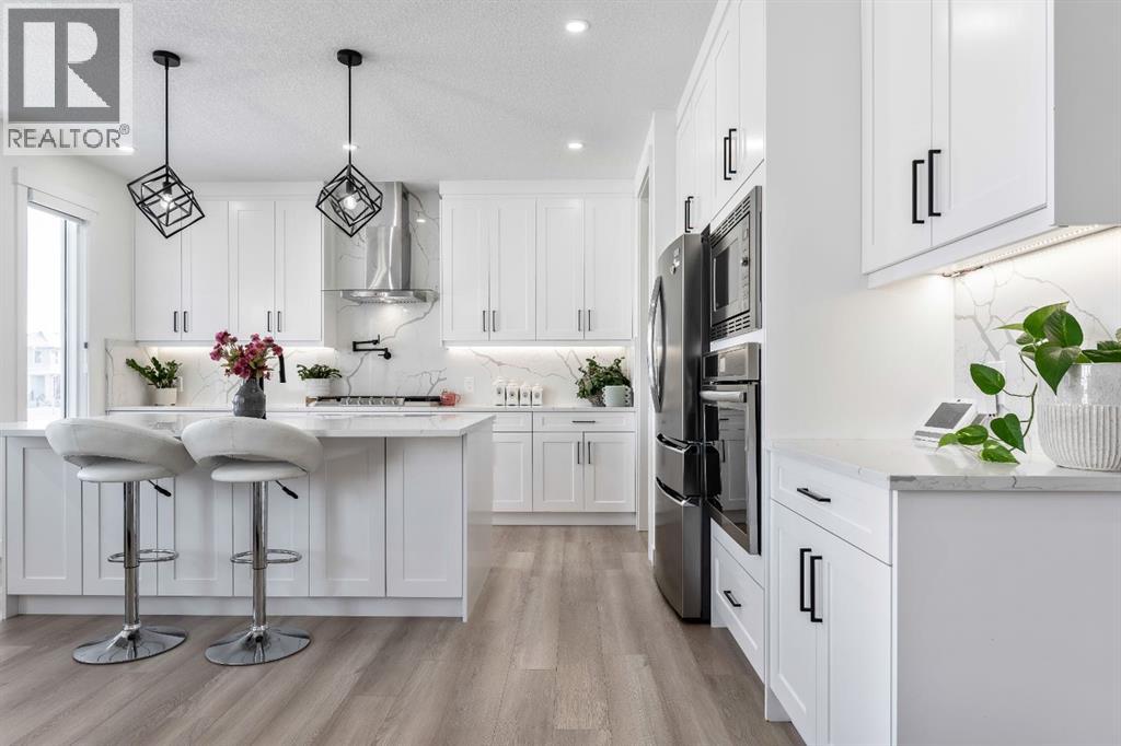 27 Bridges Drive, Langdon, Alberta  T0J 1X3 - Photo 6 - A2281647