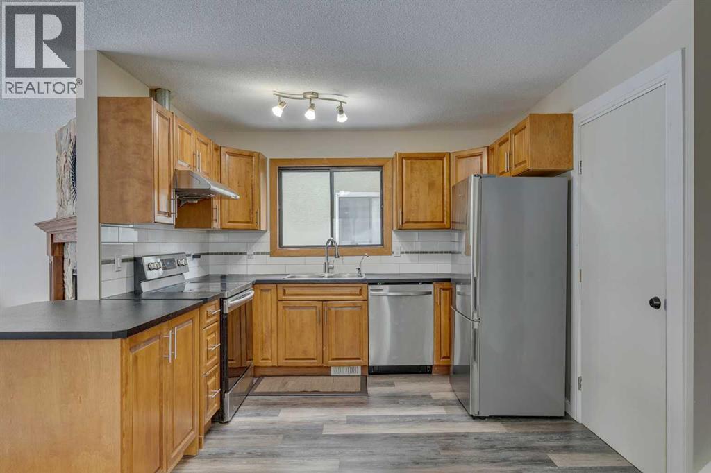 68 Woodglen Close Sw, Calgary, Alberta  T2W 4N1 - Photo 11 - A2274552