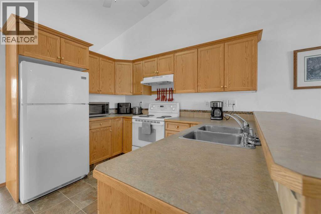 31 Elreg Street, Penhold, Alberta  T0M 1R0 - Photo 5 - A2282482