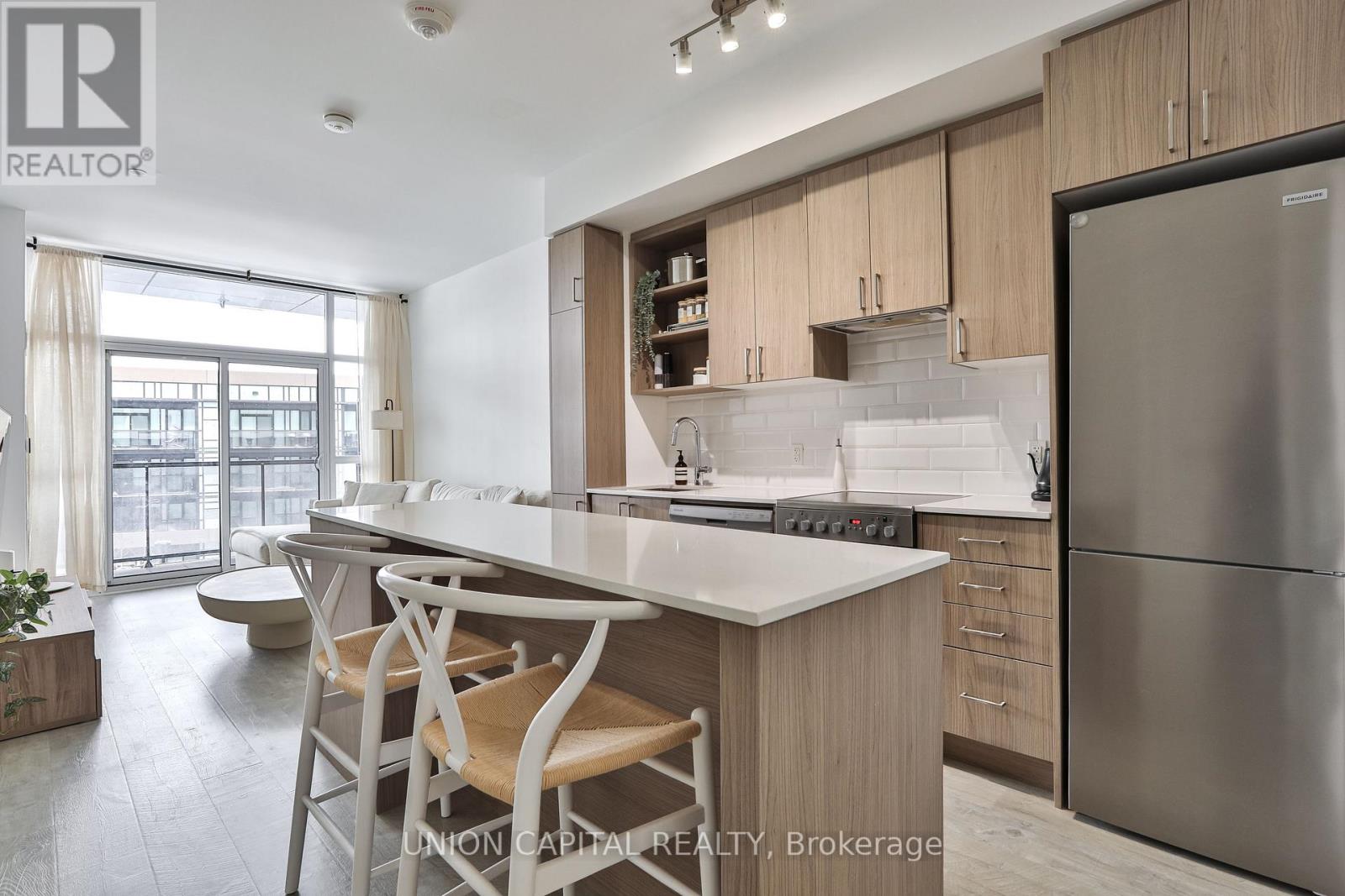 303 - 50 George Butchart Drive, Toronto, Ontario  M3K 0C9 - Photo 3 - W12755028