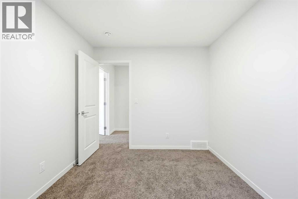 185 Edith Green Nw, Calgary, Alberta  T3R 2H2 - Photo 31 - A2281548