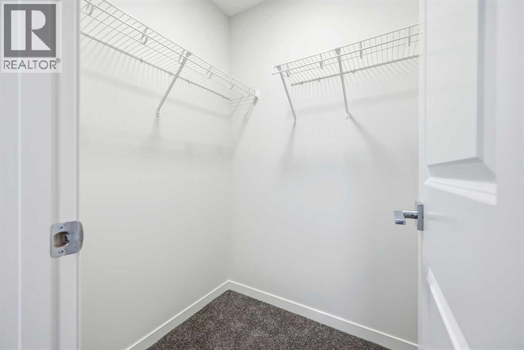 185 Edith Green Nw, Calgary, Alberta  T3R 2H2 - Photo 32 - A2281548