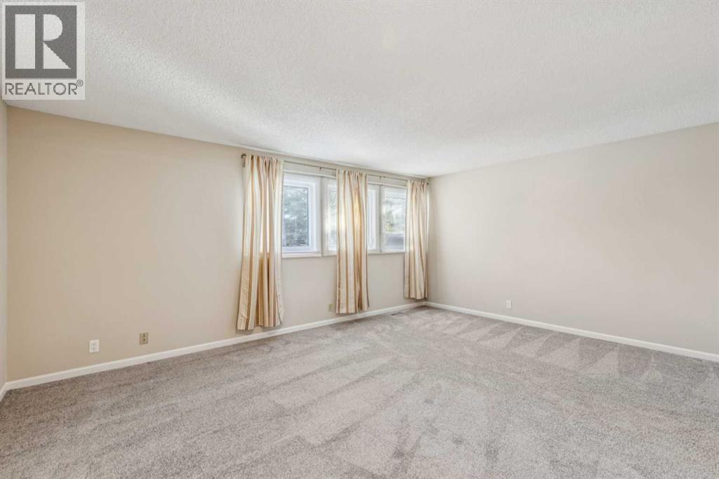 2, 275 Woodridge Drive Sw, Calgary, Alberta  T2W 4S4 - Photo 31 - A2281168