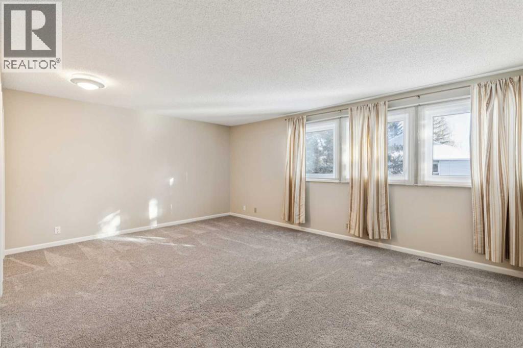 2, 275 Woodridge Drive Sw, Calgary, Alberta  T2W 4S4 - Photo 30 - A2281168