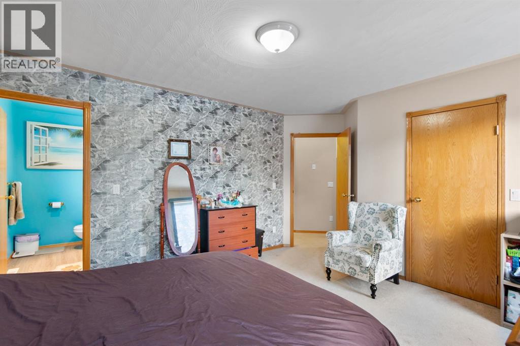 107 Monica Bay, Carstairs, Alberta  T0M 0N0 - Photo 15 - A2277960
