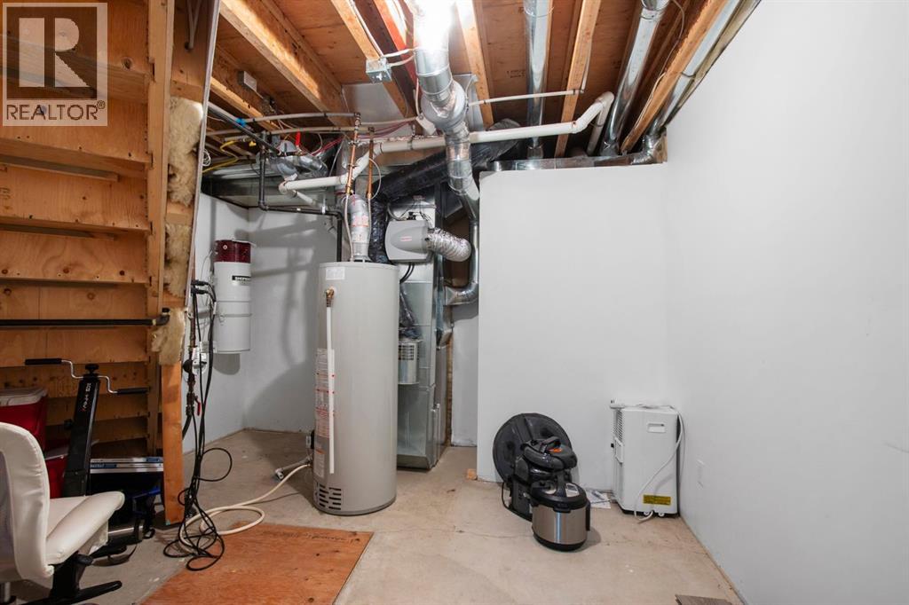 107 Monica Bay, Carstairs, Alberta  T0M 0N0 - Photo 25 - A2277960