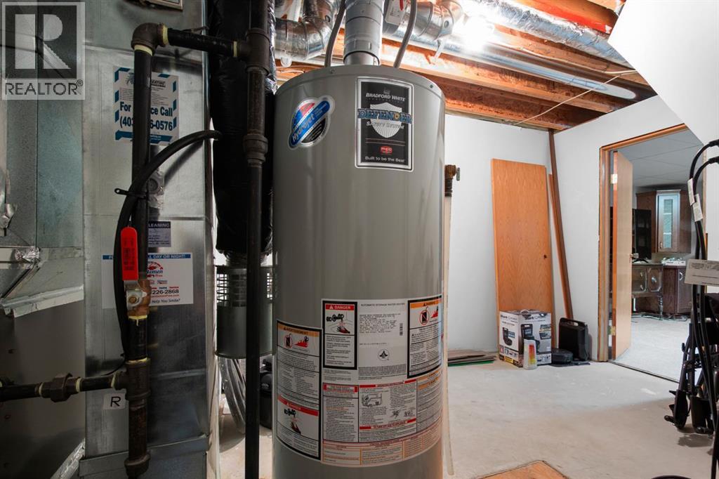 107 Monica Bay, Carstairs, Alberta  T0M 0N0 - Photo 26 - A2277960