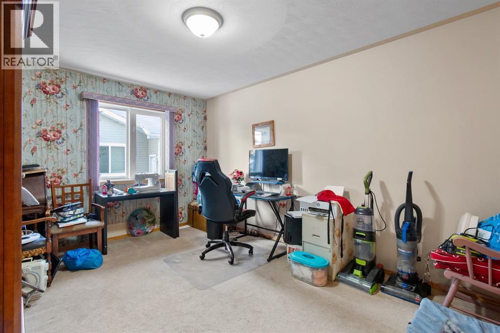 107 Monica Bay, Carstairs, Alberta  T0M 0N0 - Photo 12 - A2277960