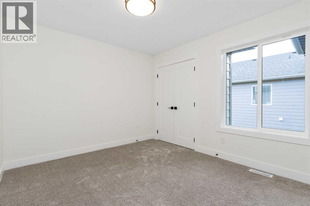 704 Mandalay Boulevard, Carstairs, Alberta  T0M 0N0 - Photo 24 - A2258188