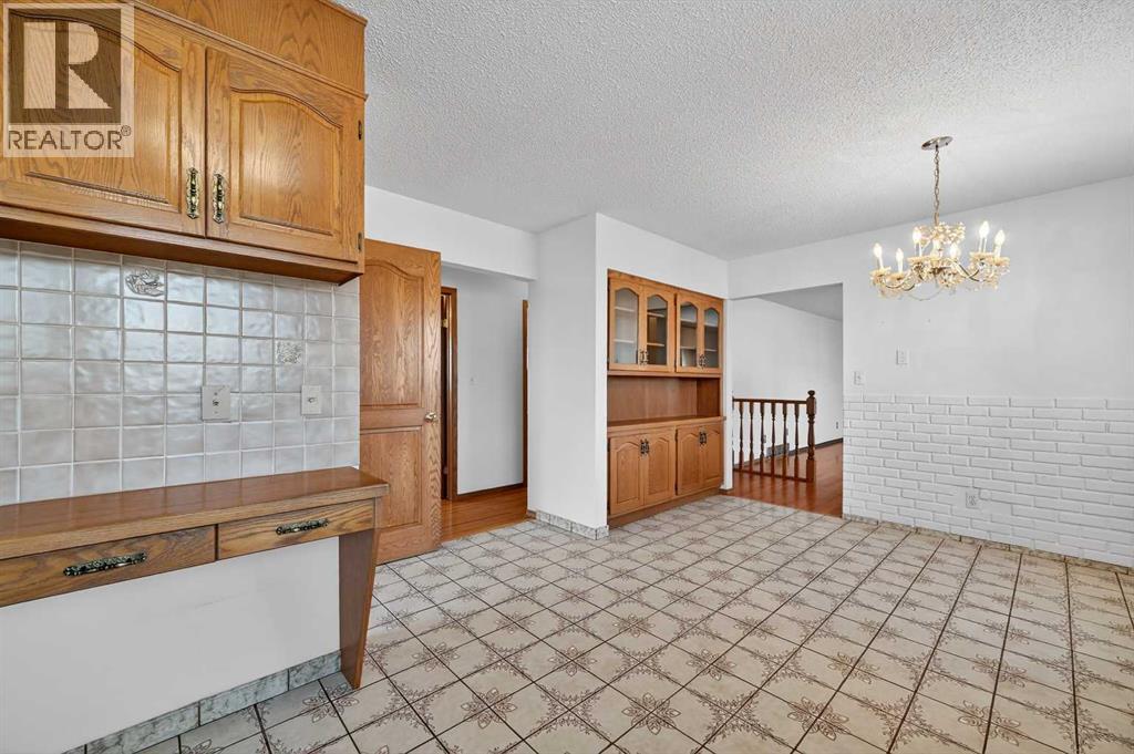 7228 Huntridge Hill Ne, Calgary, Alberta  T2K 4A5 - Photo 12 - A2279509