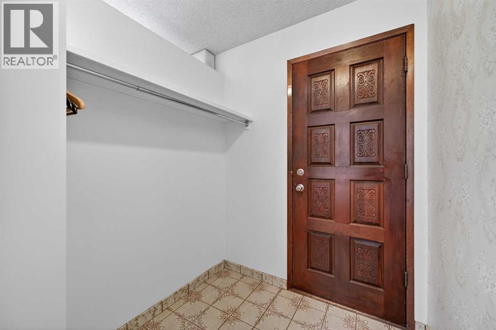 7228 Huntridge Hill Ne, Calgary, Alberta  T2K 4A5 - Photo 3 - A2279509