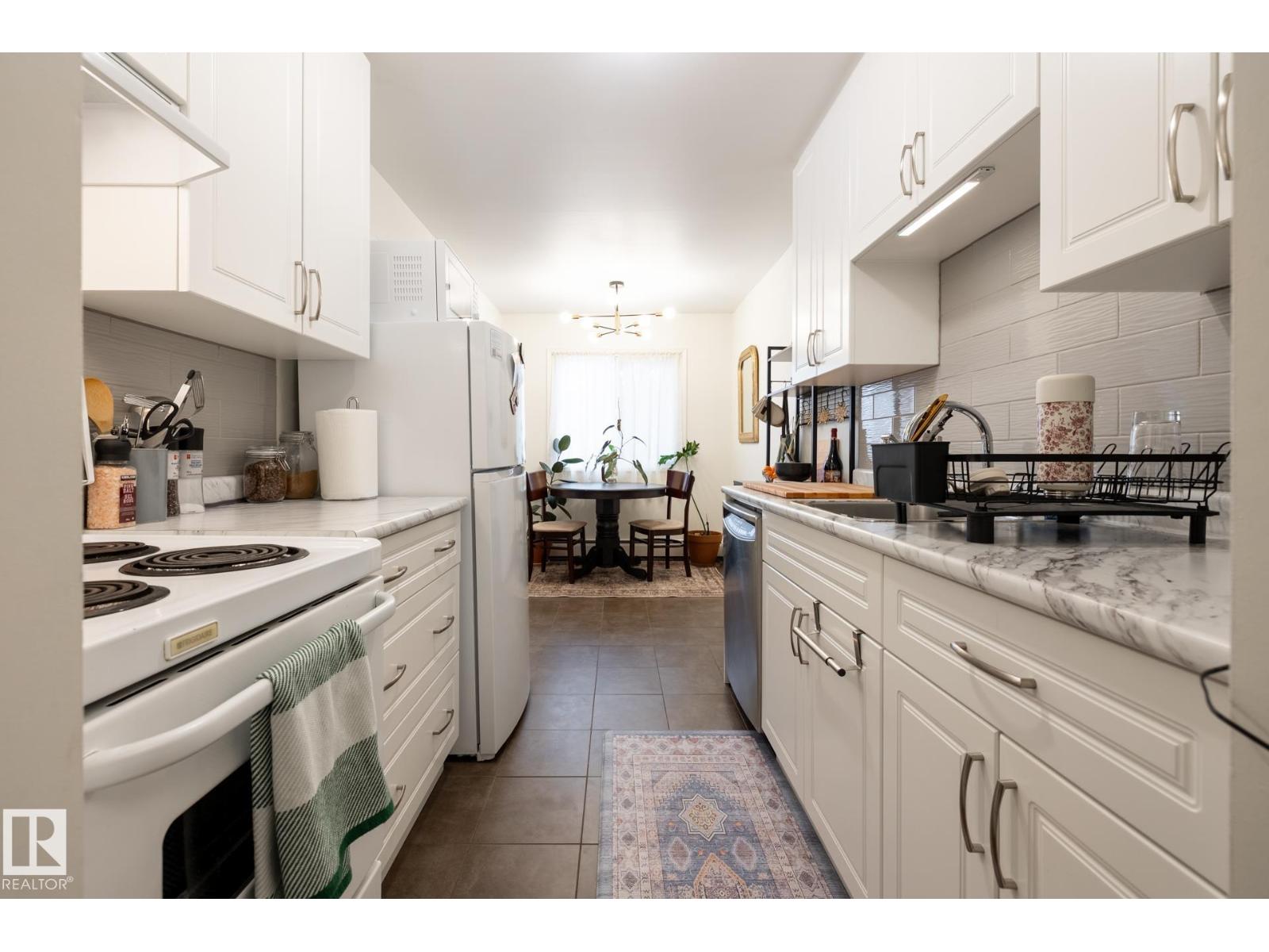 #307 5730 Riverbend Rd Nw, Edmonton, Alberta T6H 4H4 - Photo 1 - E4471833