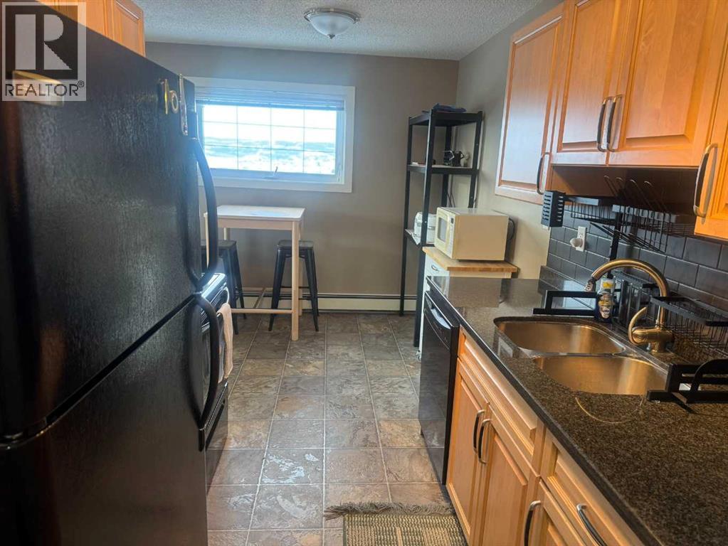 305, 9005 99 Street, Peace River, Alberta  T8S 1H1 - Photo 2 - A2279625