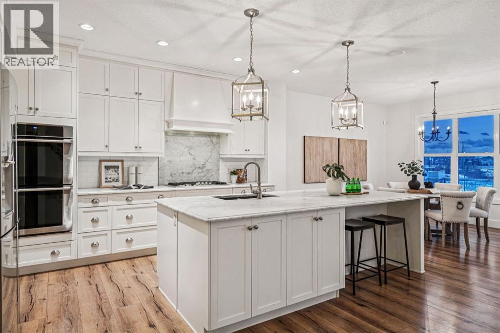 47 Sundown Way, Cochrane, Alberta  T4C 0H4 - Photo 4 - A2282998