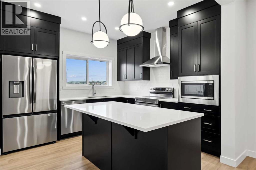 351 Fireside Drive, Cochrane, Alberta  T4C 3J1 - Photo 3 - A2254442