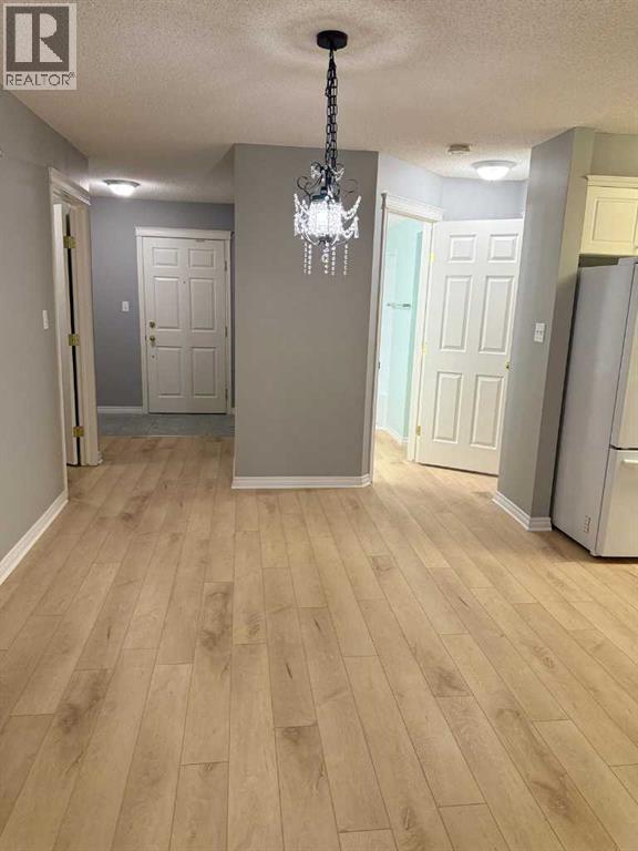 216, 6800 Hunterview Drive Nw, Calgary, Alberta  T2K 6K5 - Photo 8 - A2278413