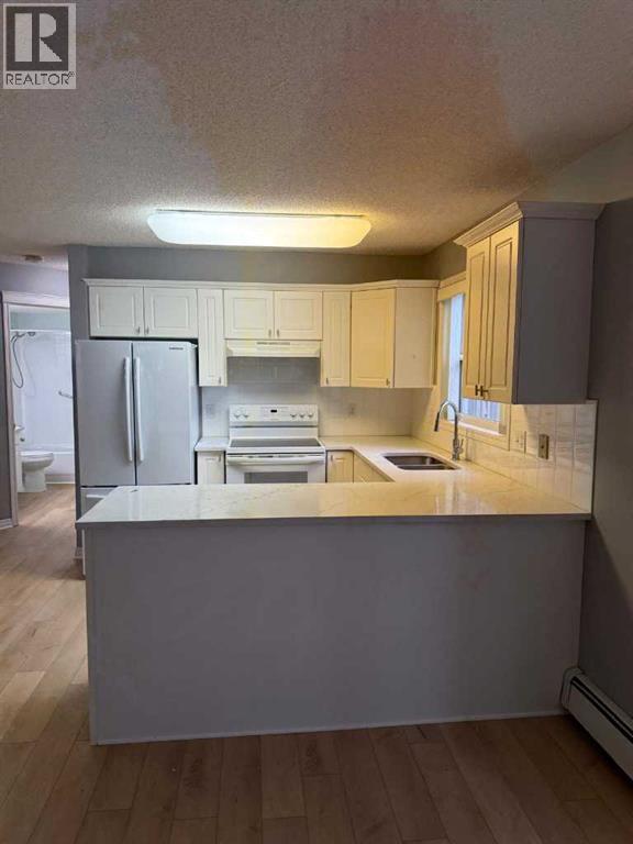 216, 6800 Hunterview Drive Nw, Calgary, Alberta  T2K 6K5 - Photo 10 - A2278413