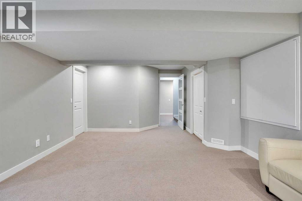 157 Rainbow Falls Boulevard, Chestermere, Alberta  T1X 0N6 - Photo 34 - A2276880