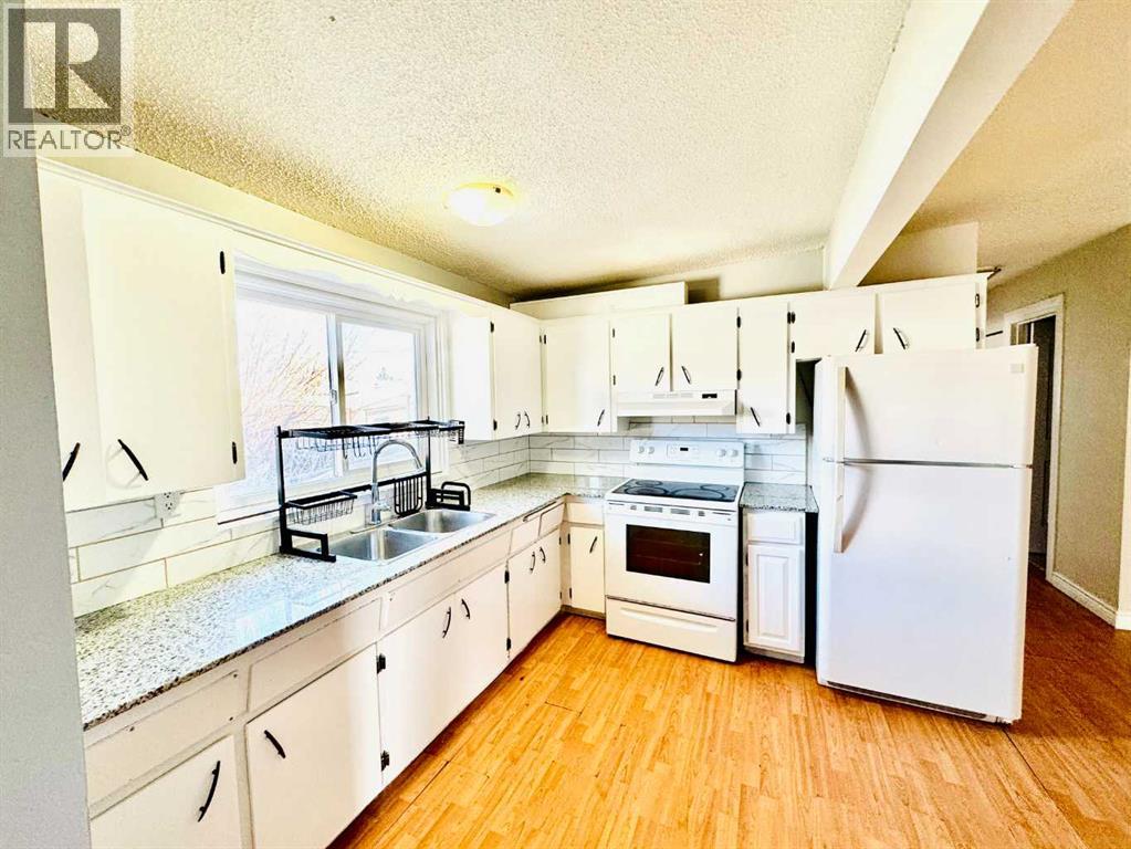 203 Penbrooke Close Se, Calgary, Alberta  T2A 3N9 - Photo 5 - A2256139