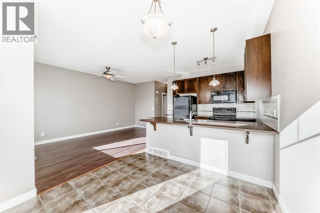 33 Cimarron Vista Gardens, Okotoks, Alberta  T1S 0G2 - Photo 9 - A2263043