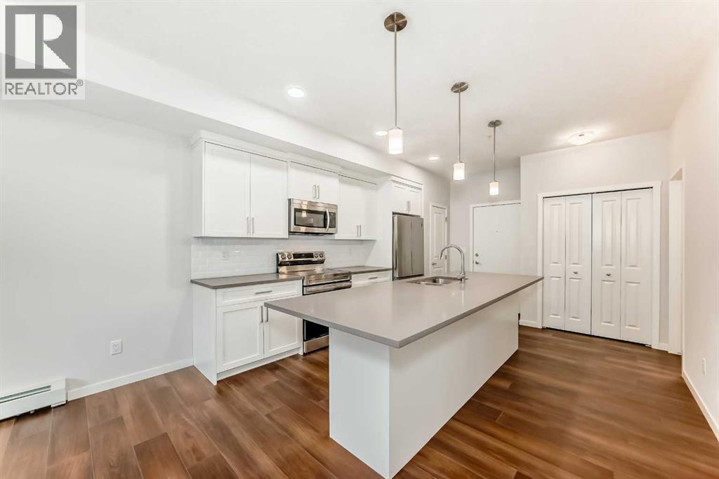 104, 360 Harvest Hills Common Ne, Calgary, Alberta  T3K 2N1 - Photo 5 - A2283549