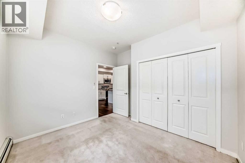 104, 360 Harvest Hills Common Ne, Calgary, Alberta  T3K 2N1 - Photo 23 - A2283549