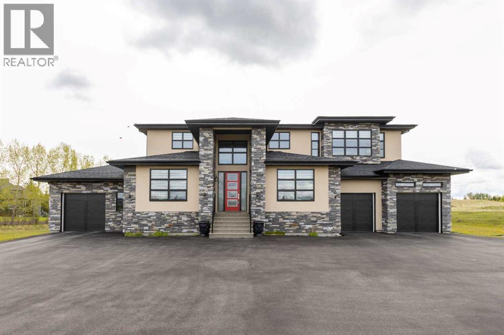 4 Villosa Ridge Point, Rural Rocky View County, Alberta  T3Z 1H3 - Photo 2 - A2227857