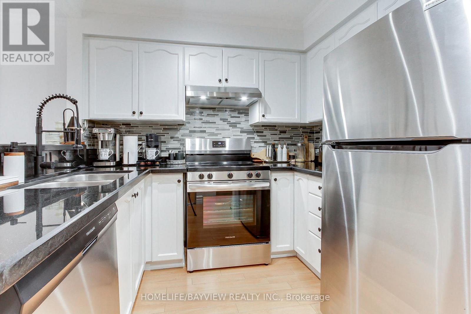 110 - 245 Pine Grove Road, Vaughan (Islington Woods), Ontario  L4L 2H7 - Photo 4 - N12756582