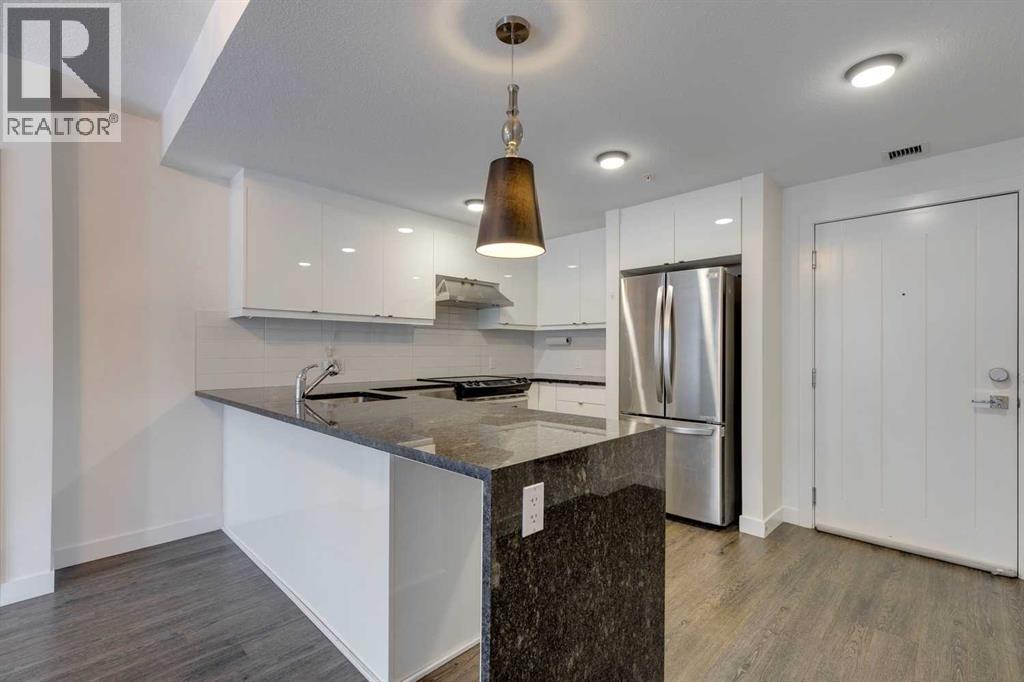 103, 25 Aspenmont Heights Sw, Calgary, Alberta  T3H 0E4 - Photo 2 - A2274638