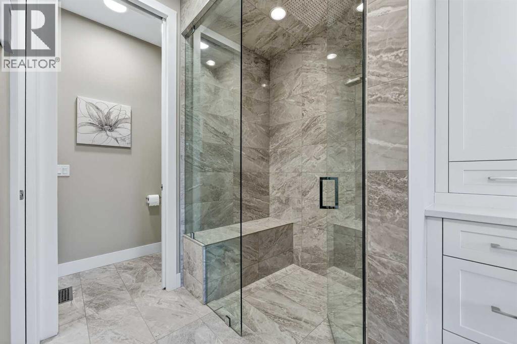 25 Rock Lake Heights Nw, Calgary, Alberta  T3G 0G1 - Photo 27 - A2275743