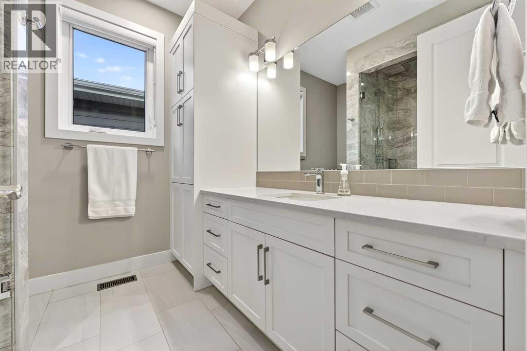 25 Rock Lake Heights Nw, Calgary, Alberta  T3G 0G1 - Photo 32 - A2275743