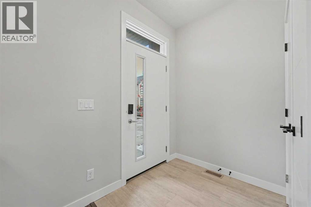 137 Sage Meadows Gardens Nw, Calgary, Alberta  T3P 1K2 - Photo 2 - A2281639