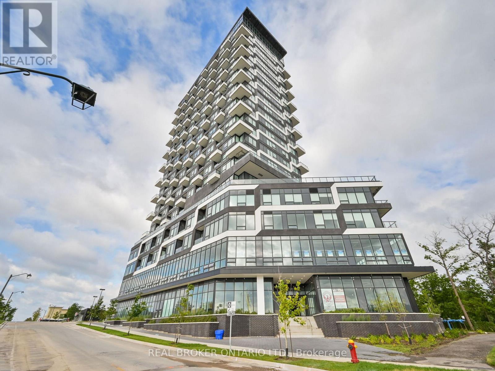 411 - 297 Oak Walk Drive, Oakville, Ontario  L6H 3R6 - Photo 2 - W12754664