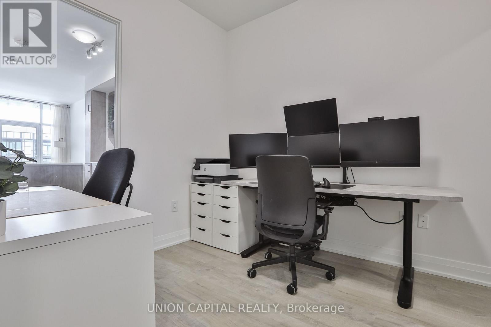 303 - 50 George Butchart Drive, Toronto, Ontario  M3K 0C9 - Photo 2 - W12755028