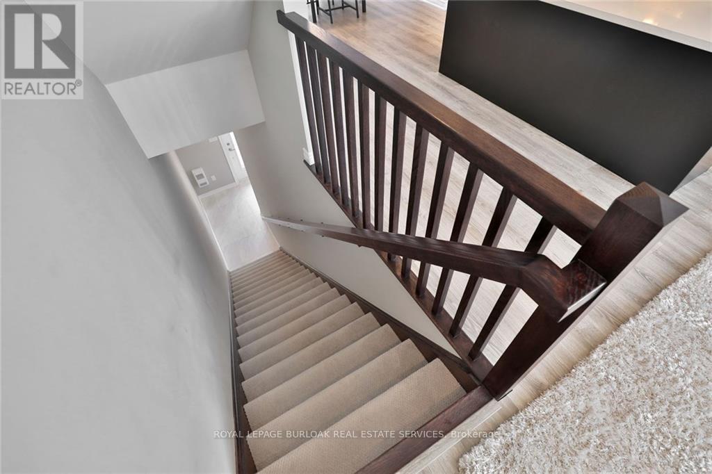 65 Esplanade Lane, Grimsby, Ontario  L3M 0H2 - Photo 4 - X12754532